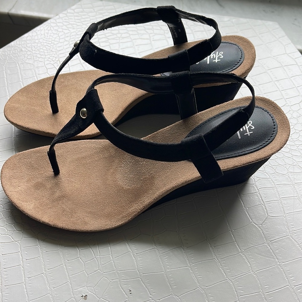 Black and brown wedge heels